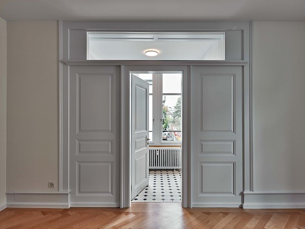 Sanierung und Umbau eines Mehrfamilienhauses mit Attikawohnung im Zürcher Stadtzentrum