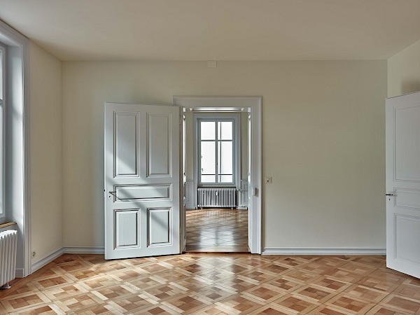 Sanierung und Umbau eines Mehrfamilienhauses mit Attikawohnung im Zürcher Stadtzentrum