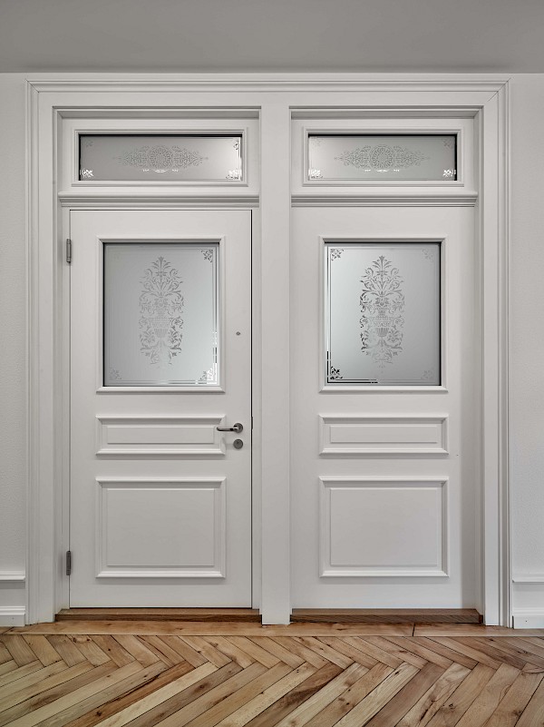 Sanierung und Umbau eines Mehrfamilienhauses mit Attikawohnung im Zürcher Stadtzentrum